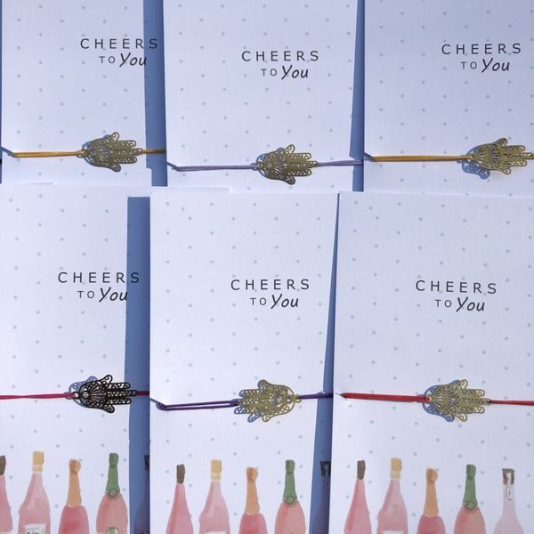 Cheers To You & Hamsa Armbändchen